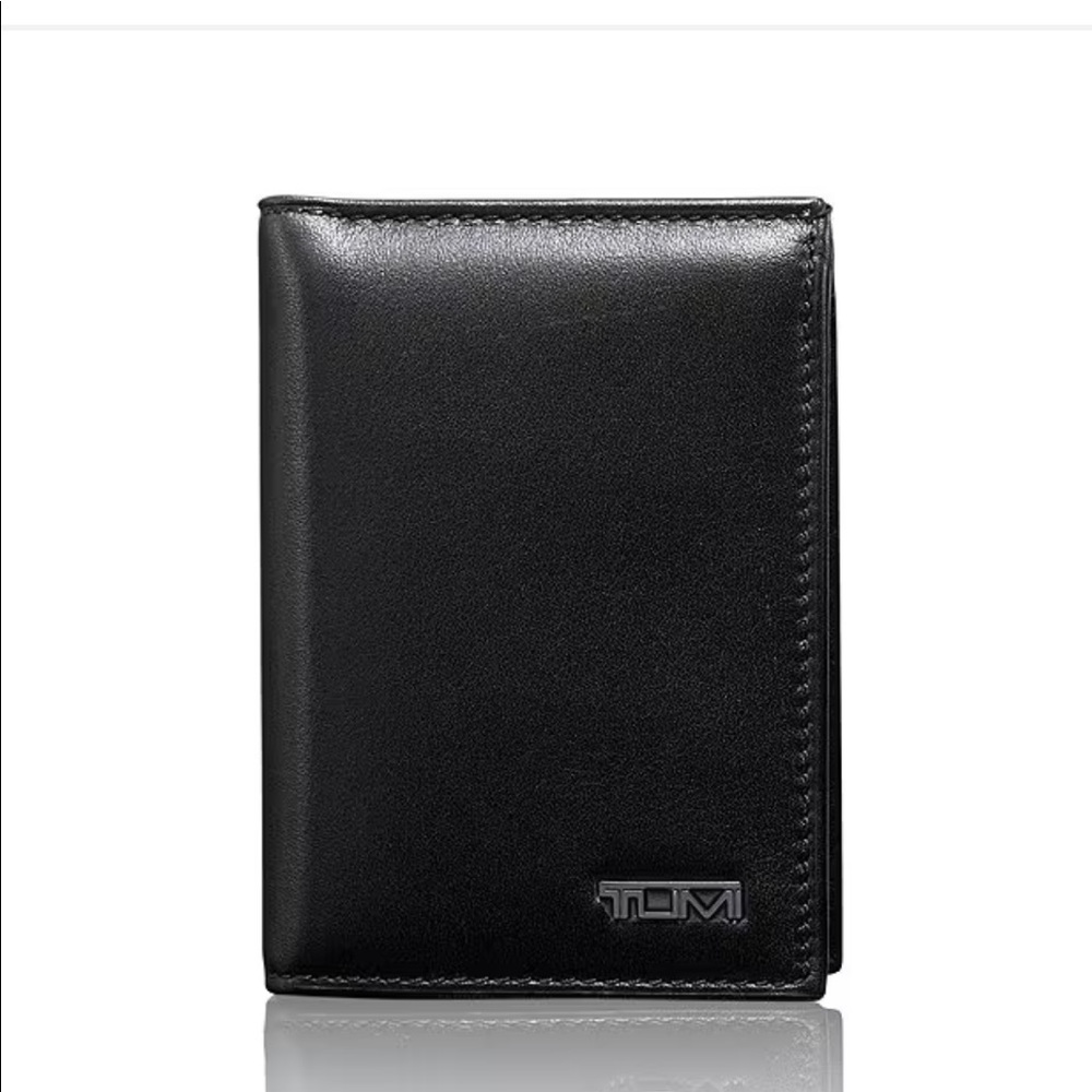 Tumi L shaped black leather wallet